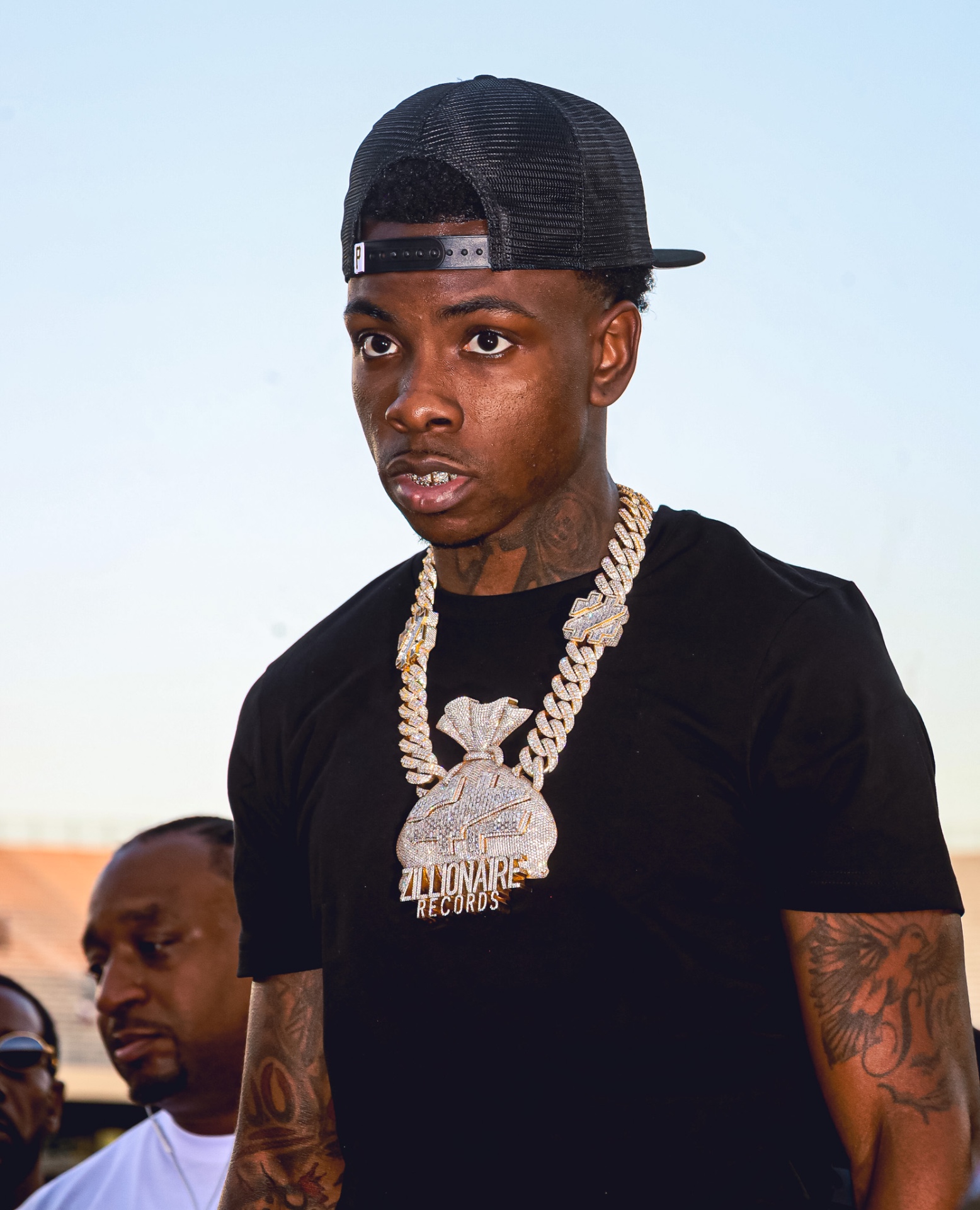 Zillionaire Records artist portrait with iced-out chain